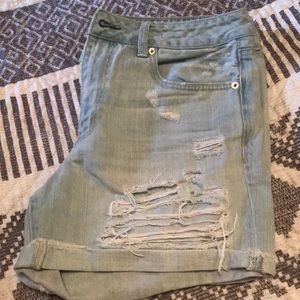 Lite wash destroyed denim shorts